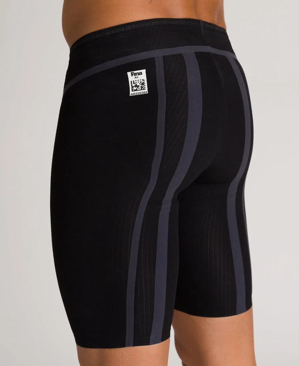Black Arena Mens Carbon Core FX Jammer swimwear, close-up view showing sleek fabric and elastic waistband for competitive swimming.