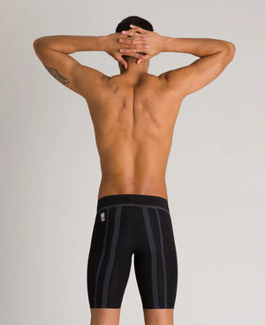 Arena men's Carbon Core FX jammer in black, close-up of the sleek, fitted swimwear designed for competitive swimming.