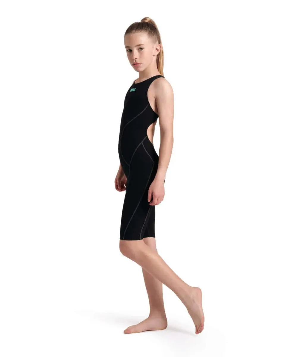 Arena Girls Powerskin Impulso Kneesuit in black and teal, designed for young swimmers, featuring a sleek fit and durable fabric.