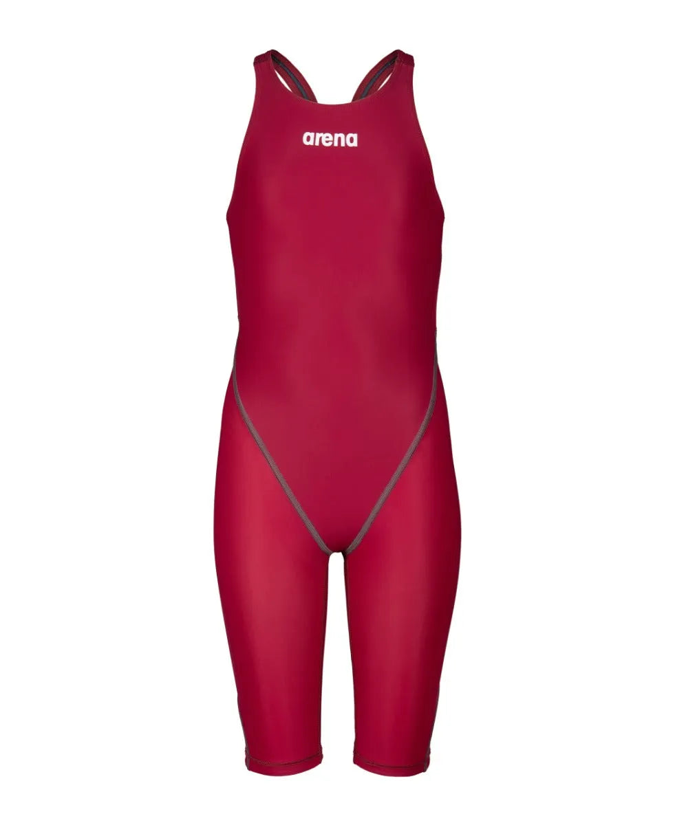 Arena Girls Powerskin ST Next kneesuit in deep red, designed for young swimmers, featuring a sleek, performance-enhancing fit.
