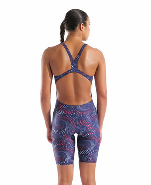 Arena women's printed full body swimsuit with red, white, and blue design, featuring a sleek knee-suit style for competitive swimming.
