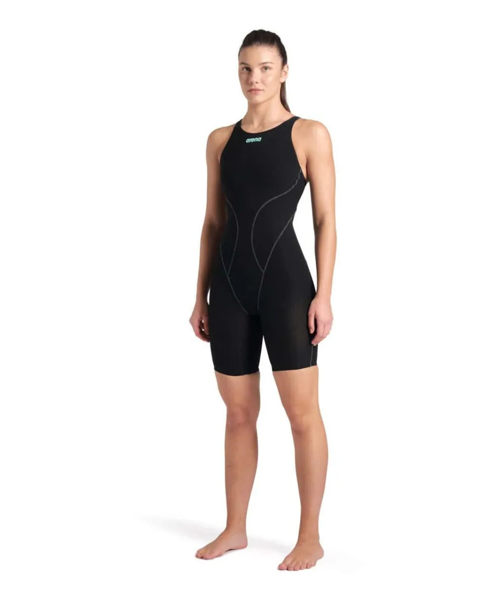 Arena Women's Powerskin Impulso openback kneesuit in black and teal, designed for competitive swimming with sleek, streamlined style.