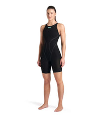 Arena Women's Powerskin Impulso openback kneesuit in black and teal, designed for competitive swimming with sleek, streamlined style.