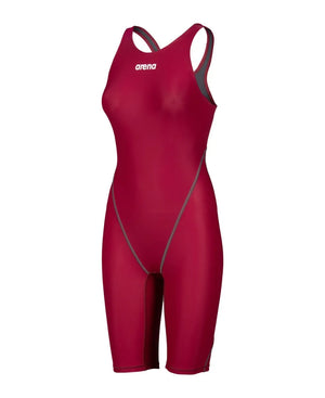 Arena Women's Powerskin ST Next Kneesuit in deep red, featuring sleek design and high-performance fabric for competitive swimming.