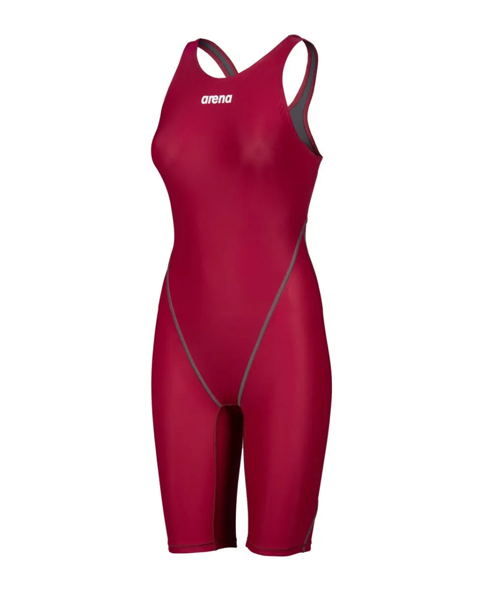 Arena Women's Powerskin ST Next Kneesuit in deep red, featuring sleek design and high-performance fabric for competitive swimming.