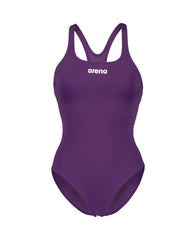Arena Women's Solid Team Swim Pro swimsuit in plum and white, featuring a sleek, fitted design ideal for competitive swimming.