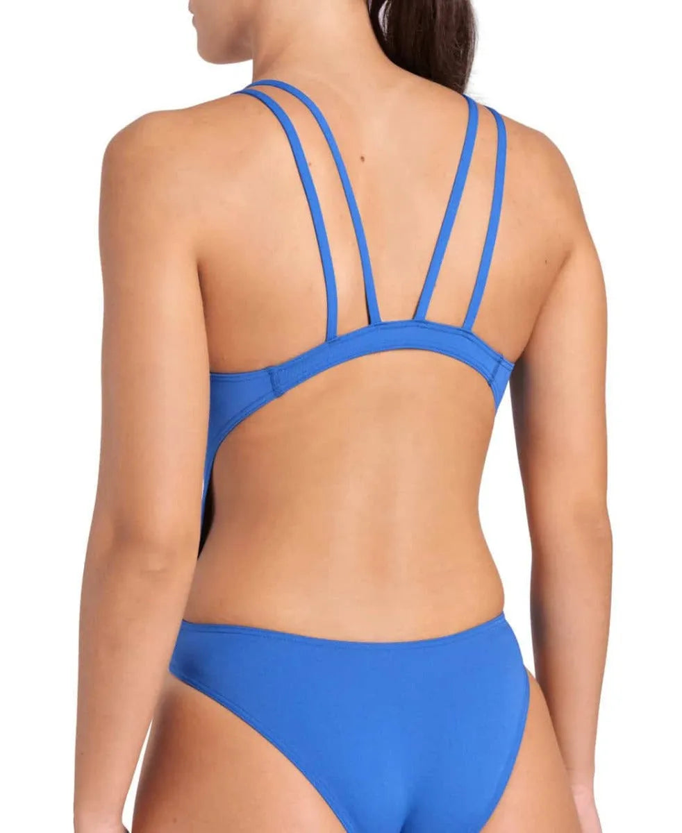 Arena women's solid tech back swimsuit in royal and white, featuring a sleek design and supportive fit for swimming.