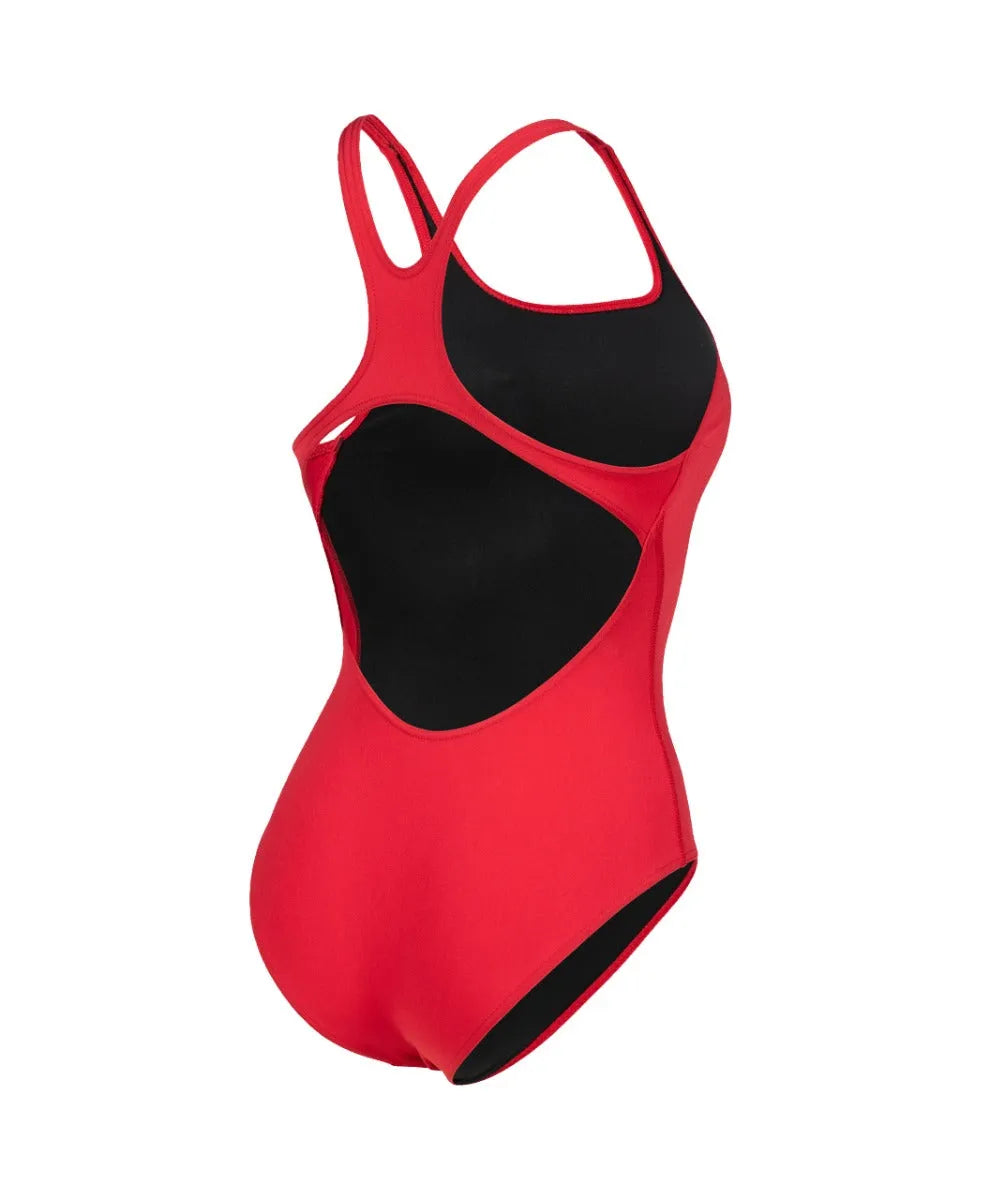 Red Arena Women's Team Swim Pro Solid Swimsuit, a sleek and fitted one-piece swimwear for women, shown on a model.