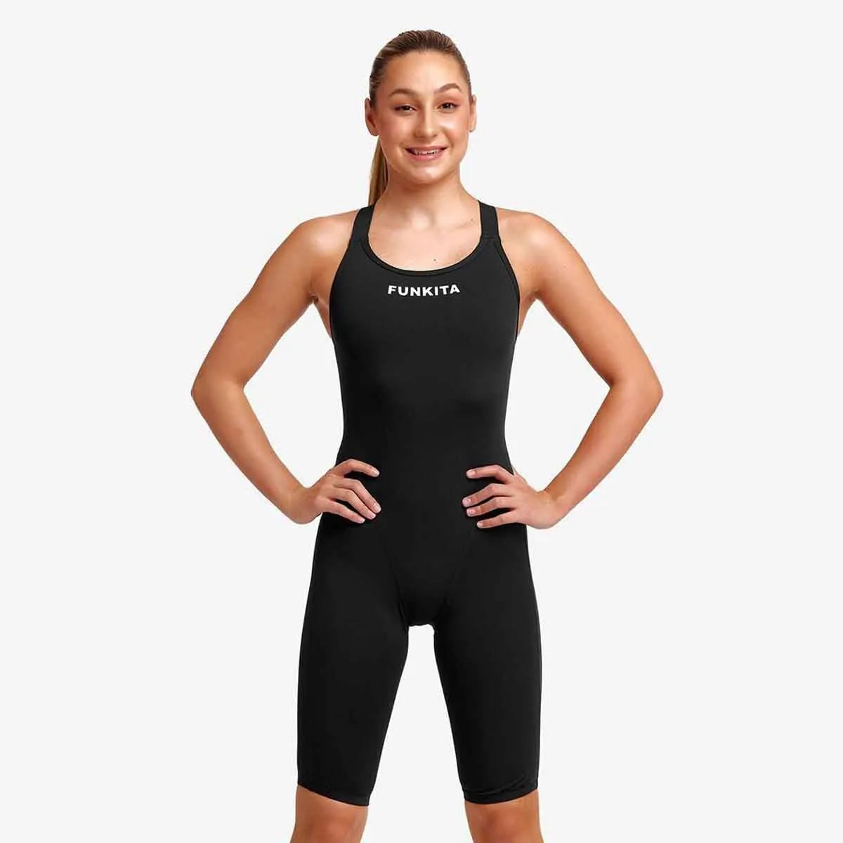Funkita Girls Still Black Fast Secure One Piece swimsuit, black kneesuit with a sleek design for young swimmers.