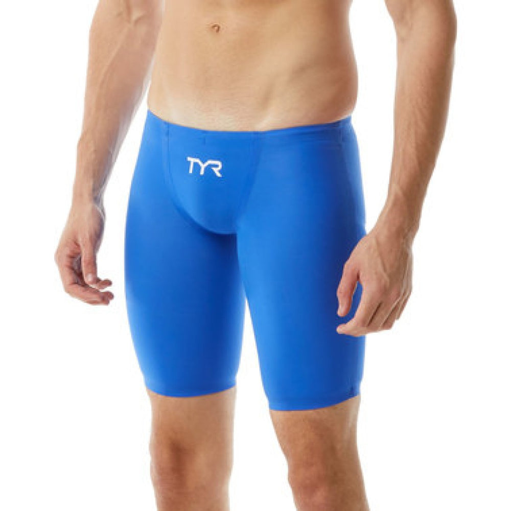 Royal blue TYR men's Invictus solid jammer swimwear, showcasing a sleek, fitted design with TYR branding on the waistband.