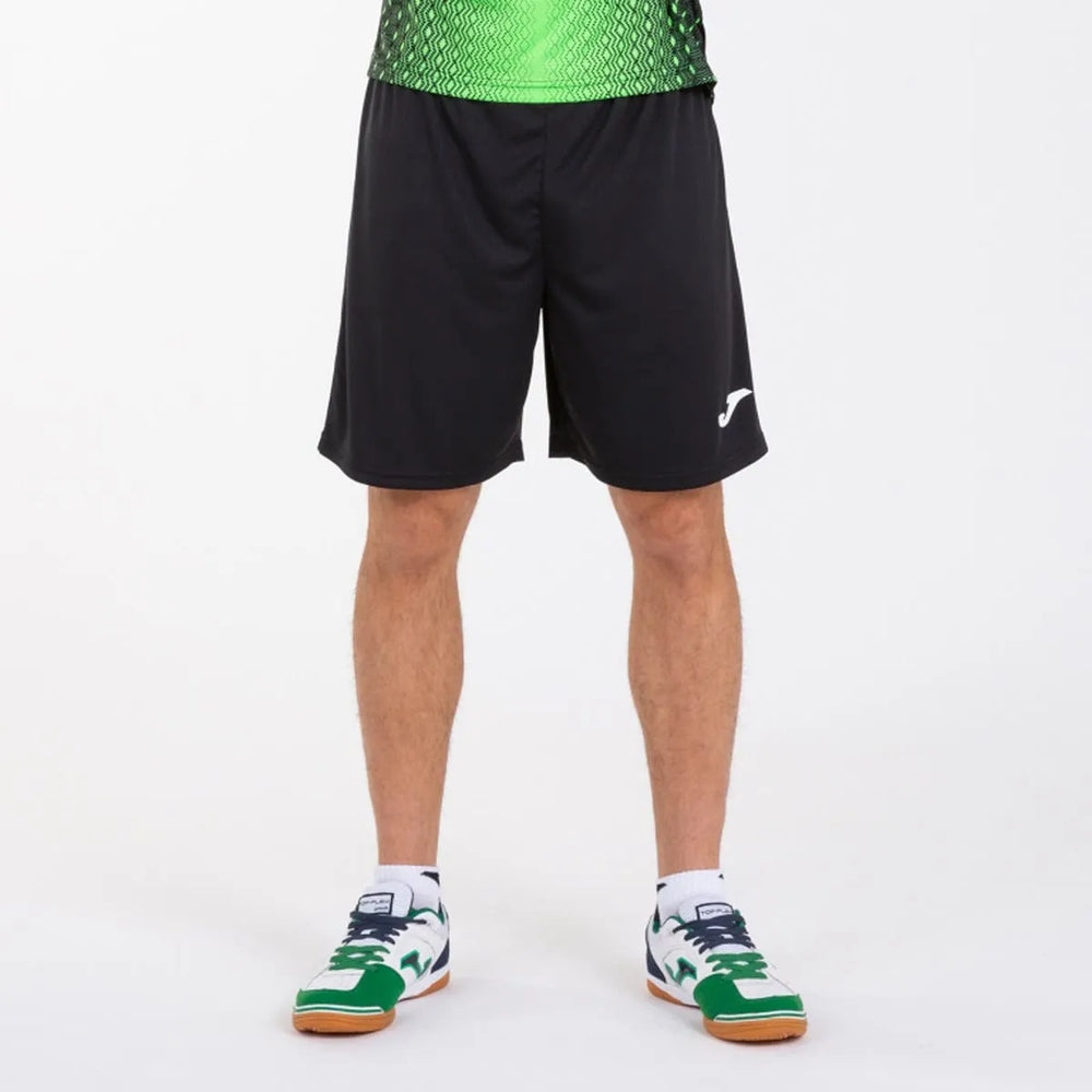 Black Joma Boys Nobel Shorts made of lightweight fabric, featuring an elastic waistband and sporty design.
