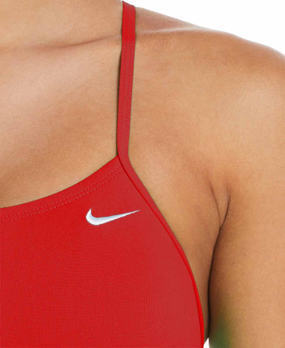 Nike women's Hydrastrong solid cut-out one-piece swimsuit in university red, featuring a sleek design with cut-out details.
