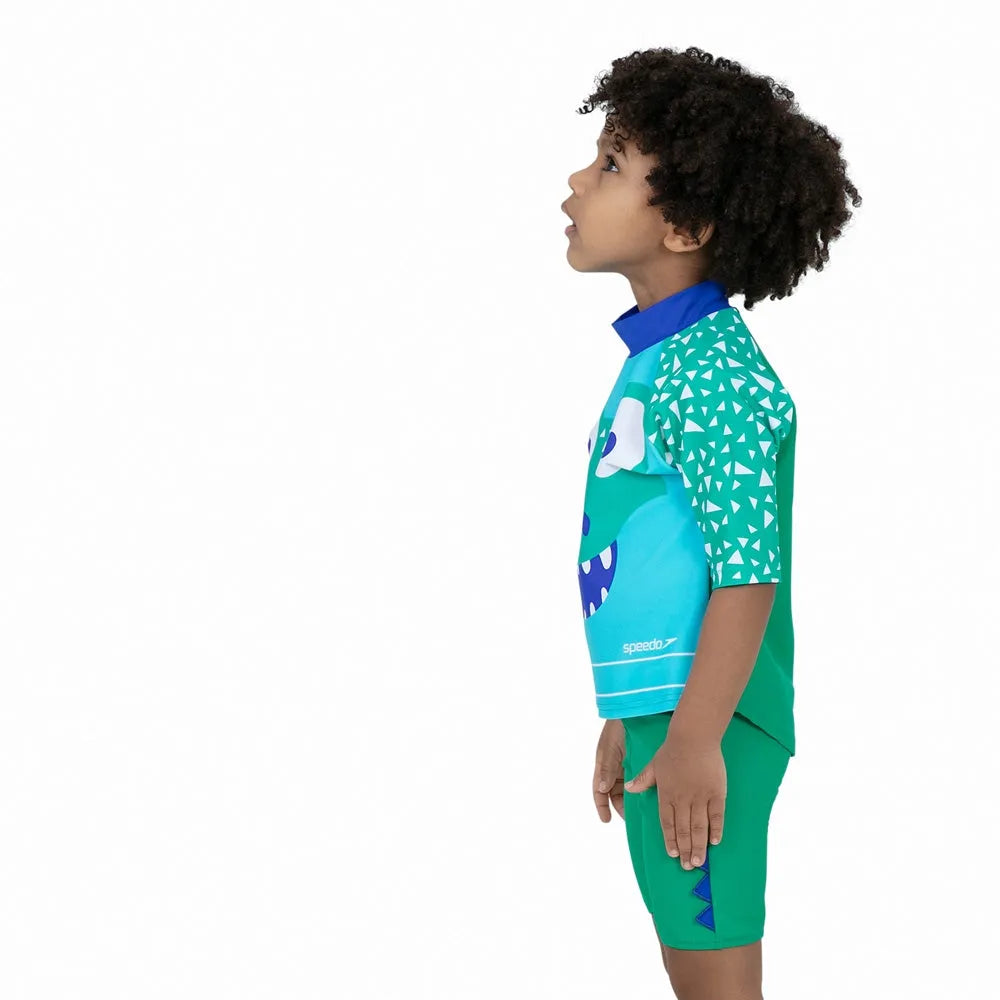 Speedo Corey Croc green swim top and shorts set for kids, lightweight rash guard and swimwear combo for water activities.