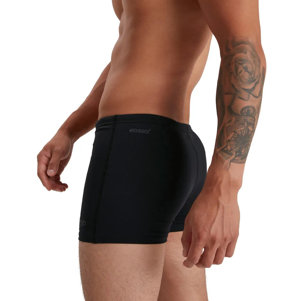 Black Speedo men's Eco Endurance+ aquashorts, close-up view showing the sleek, durable swimwear fabric and fit.