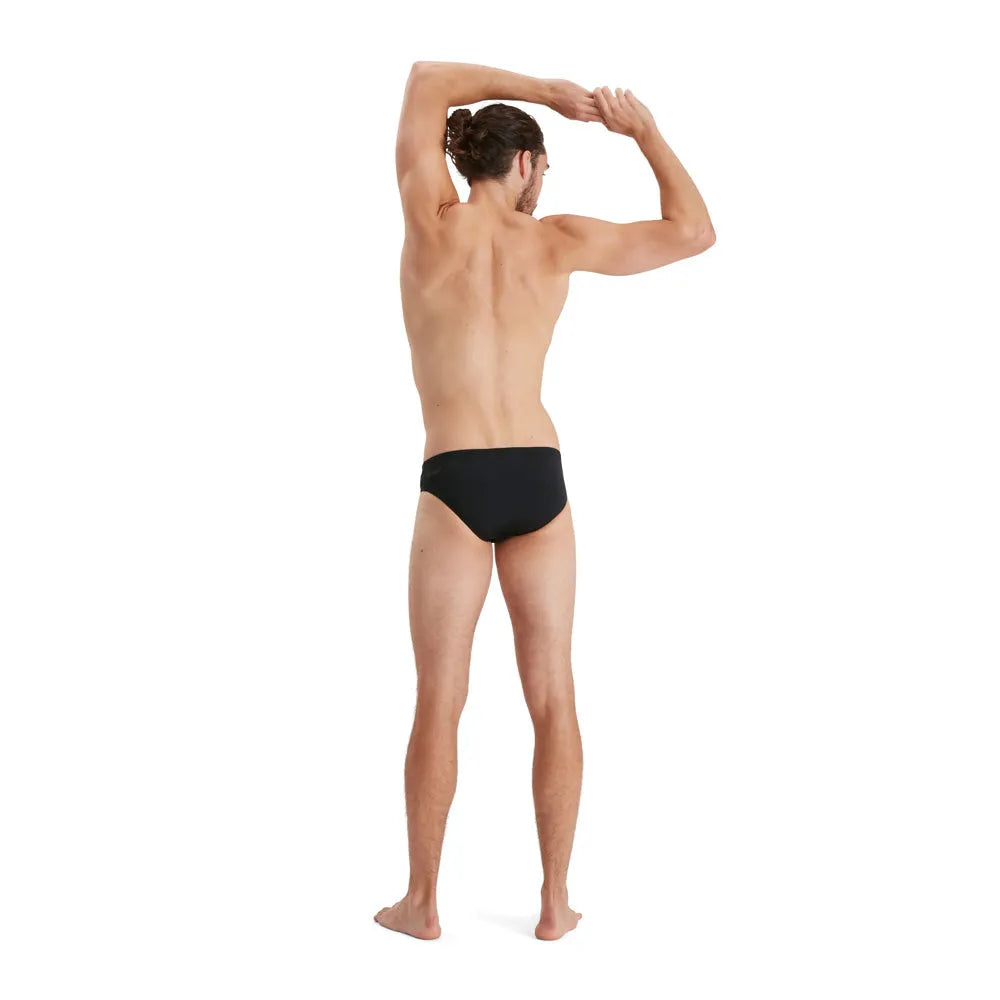 Black Speedo Eco men's Endurance+ 7cm briefs with a snug fit and durable fabric, designed for comfortable swimming.