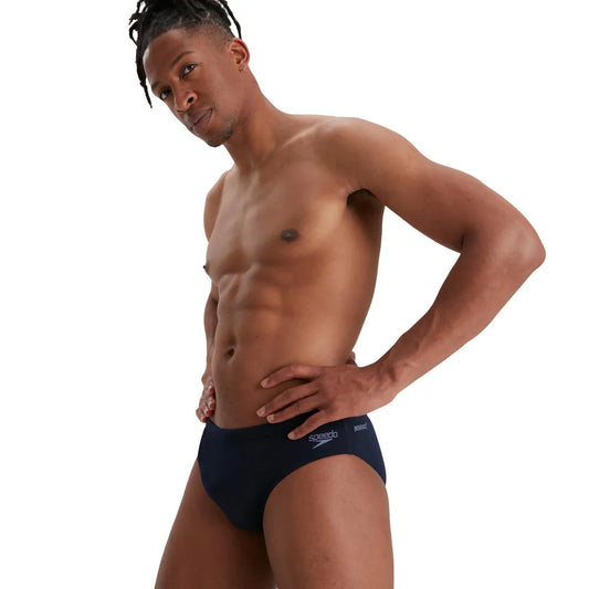 Speedo men's Eco Endurance+ 7cm swimsuit briefs, close-up showing blue fabric and elastic waistband. 1000