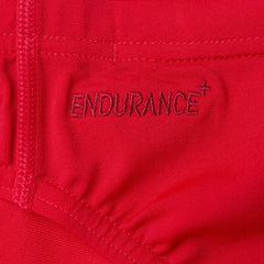 Red Speedo men's Eco Endurance+ 7cm briefs, swimwear with a snug fit and durable fabric, suitable for competitive swimming.
