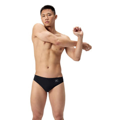 Speedo men's ML solid brief in Team Black, showing a close-up of the black swim brief with sleek design and elastic waistband.