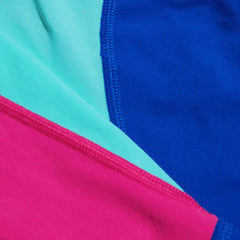 Speedo Fastskin Junior Endurance+ high-waisted jammers in cobalt, green glow, and orchid shine with bold, colorful design.