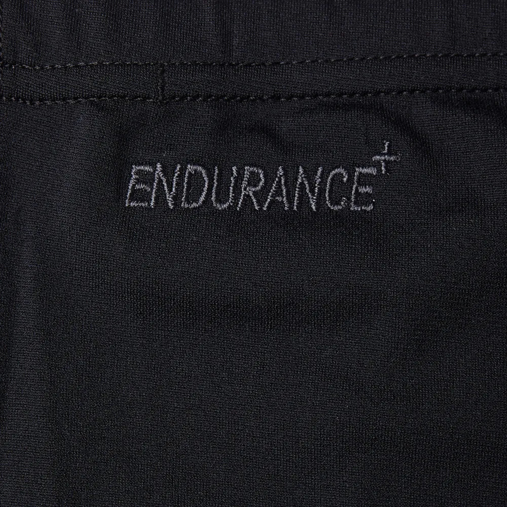 Speedo men's Eco Endurance+ jammer swimwear, close-up view showing black fabric with Speedo logo for competitive swimming