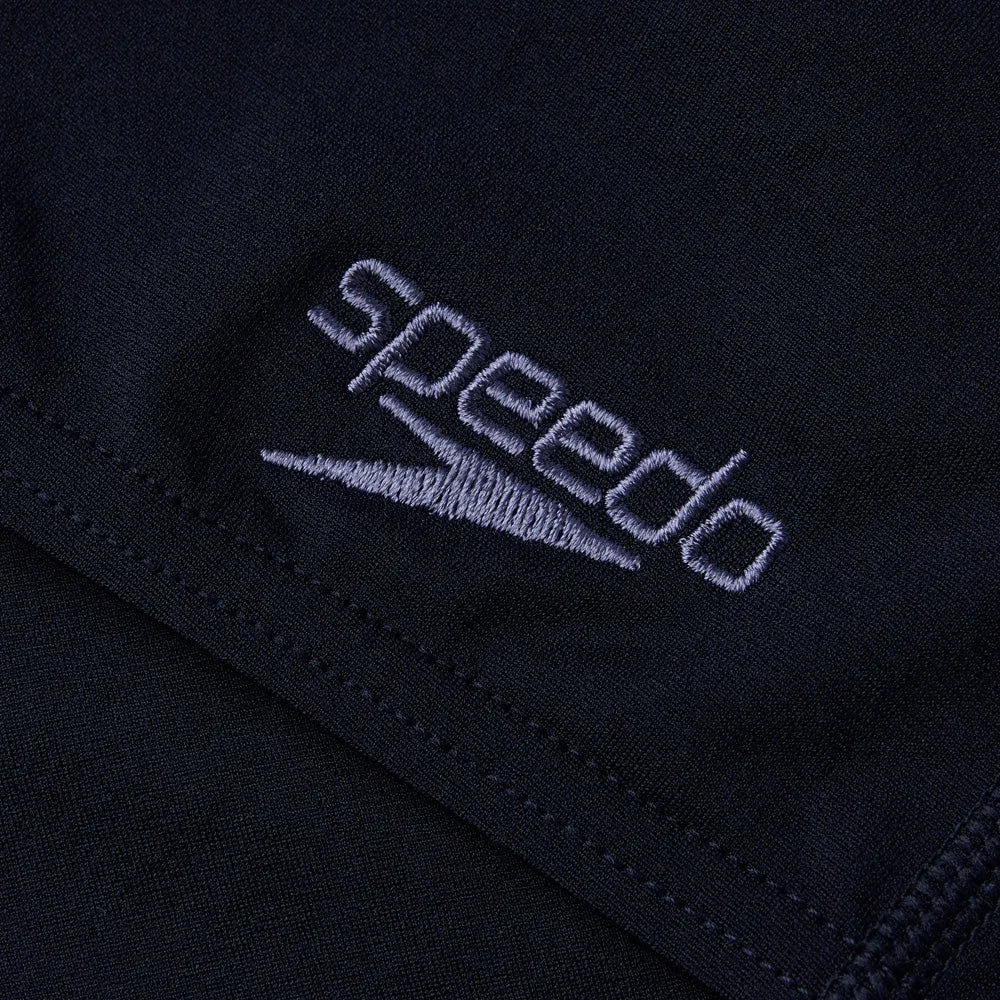 Speedo men's Eco Endurance+ jammer in navy blue, close-up of fitted swim jammers with Speedo branding and durable fabric.