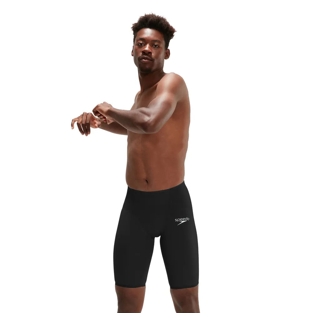 Black Speedo Men's Fastskin LZR Ignite Jammer swimming suit, close-up view showing sleek design and fabric texture.