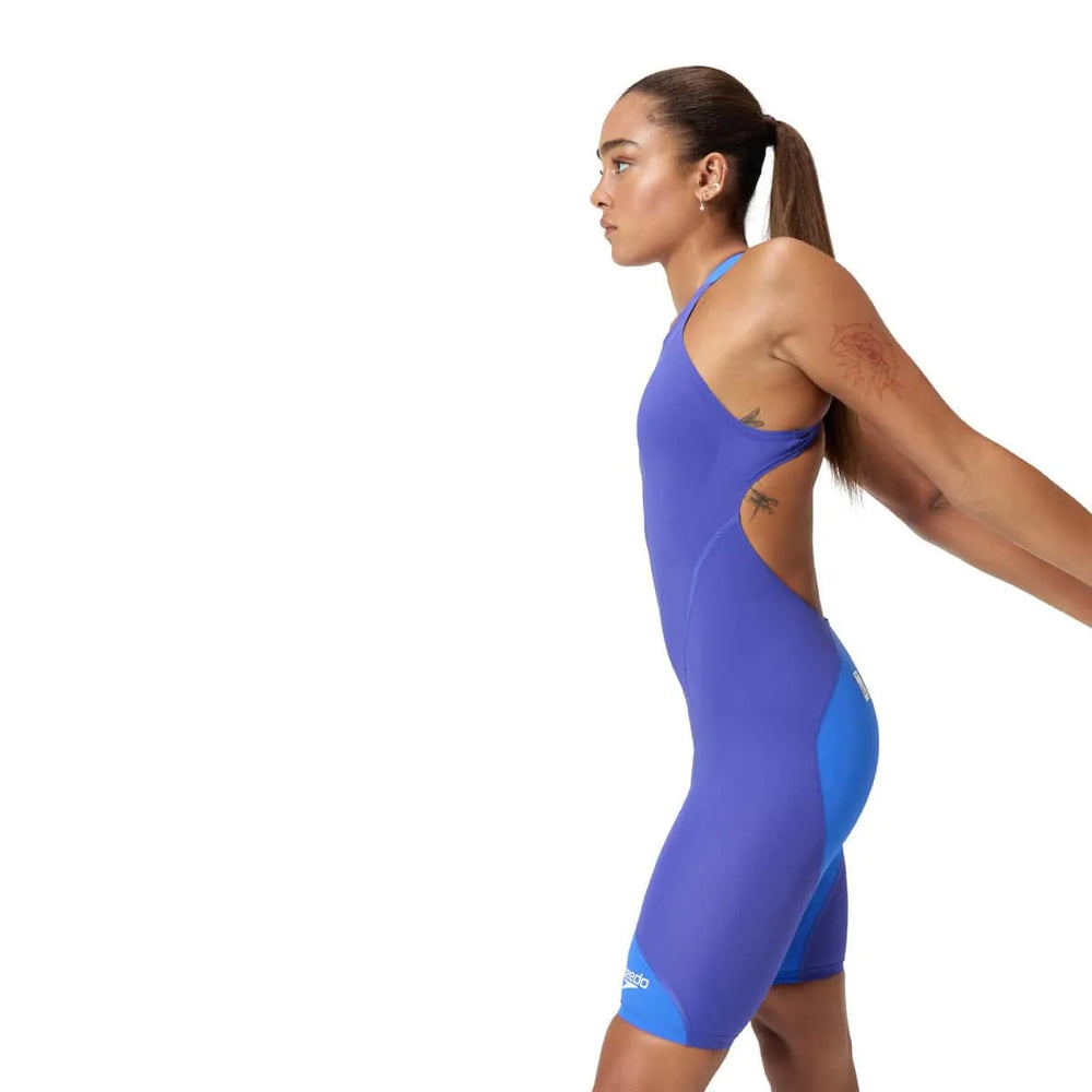 Speedo Women's Fastskin LZR Ignite purple kneeskin swimsuit, close-up view of the sleek, fitted design for competitive swimming.