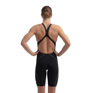 Speedo Women's Fastskin LZR Pure Intent 2 openback kneesuit in black with iridescent accents, designed for competitive swimming.