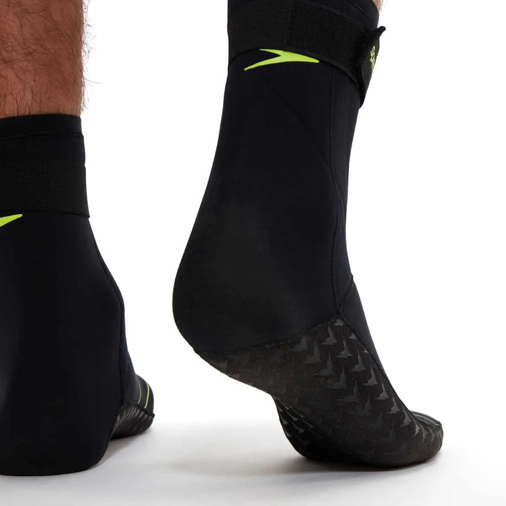 Black Speedo OW swim socks designed for water sports, featuring a snug fit and durable material for comfort and performance.