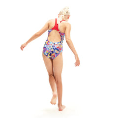 Speedo girls' digital allover splashback swimsuit with colorful pattern, designed for young swimmers, ideal for competitive or recreational swimming.