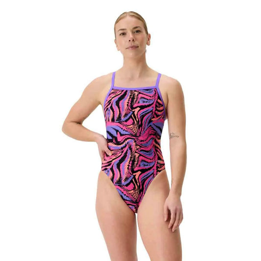 Speedo women's printed turnback swimsuit in Fusion Flare and Indigo Glow, featuring a sleek design and vibrant color pattern. 1200