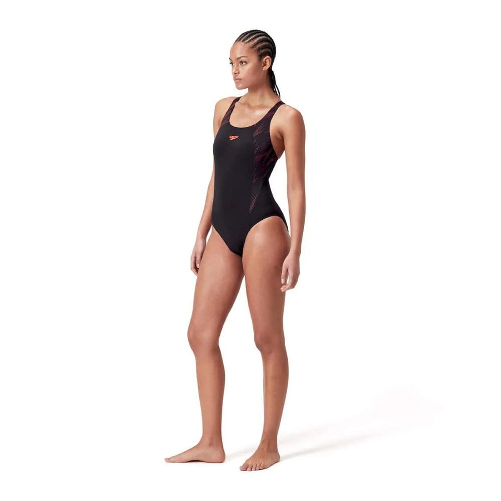 Speedo women's HyperBoom Splice muscleback swimsuit in black, plum dandy, and siren red, designed for swimming and training.