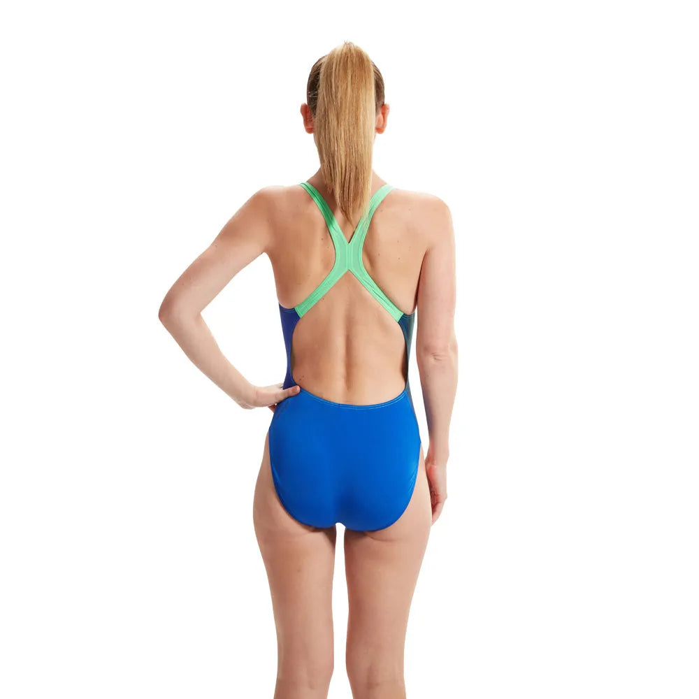 Speedo women's digital powerback swimsuit in true cobalt and harlequin green, featuring a sleek design and vibrant color pattern.