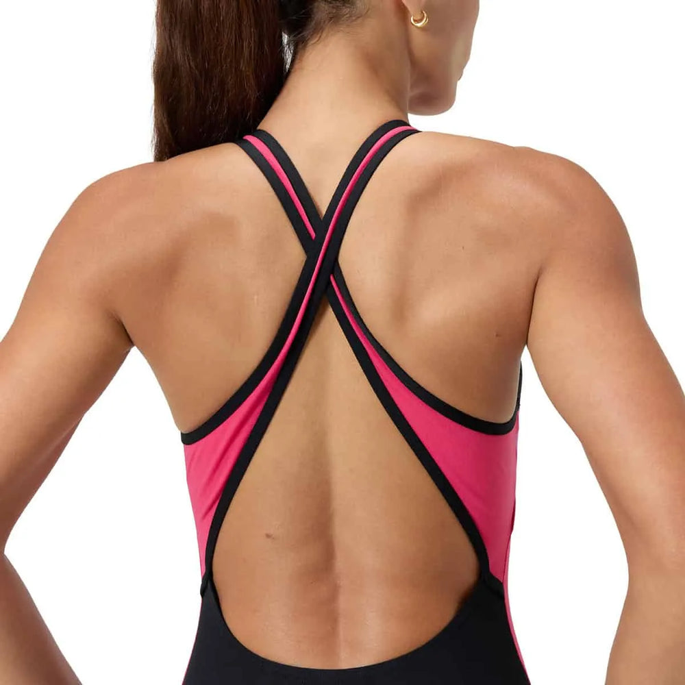 Speedo women's high neck splice cross back swimsuit in black and raspberry fill, with a sleek design and contrasting color accents.